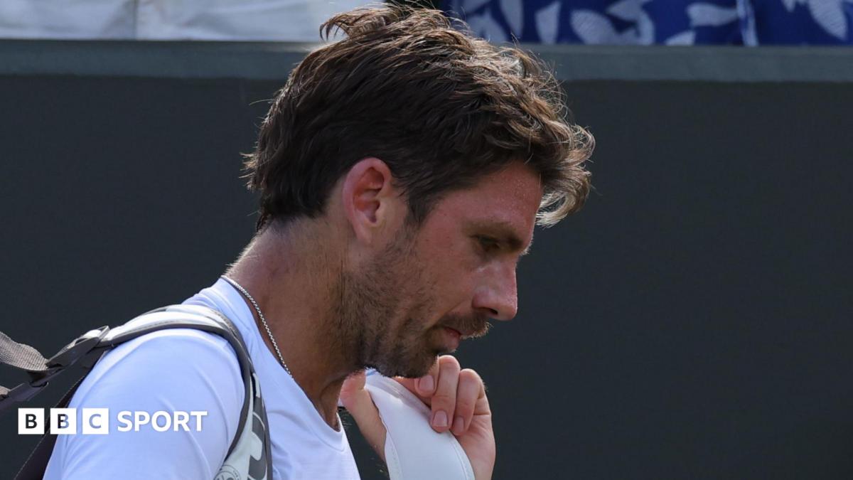 Cameron Norrie trudges off court at Wimbledon