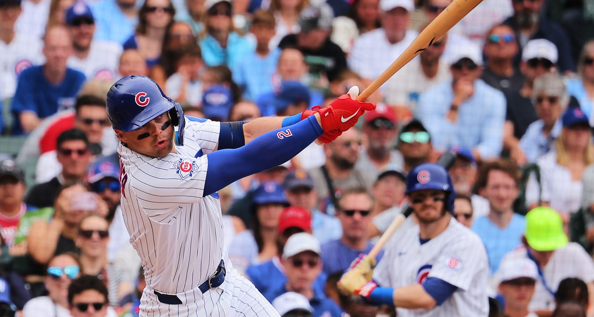Chicago Cubs' Nico Hoerner hits an RBI single during the first inning of a baseball game against the St. Louis Cardinals, Sunday, July 5, 2026, in Chicago. (AP Photo/Melissa Tamez)
