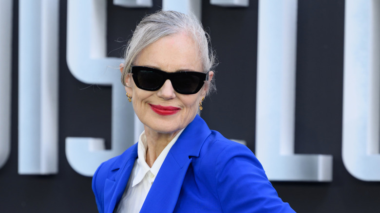 Elizabeth McGovern at an event in a blue blazer and sunglasses