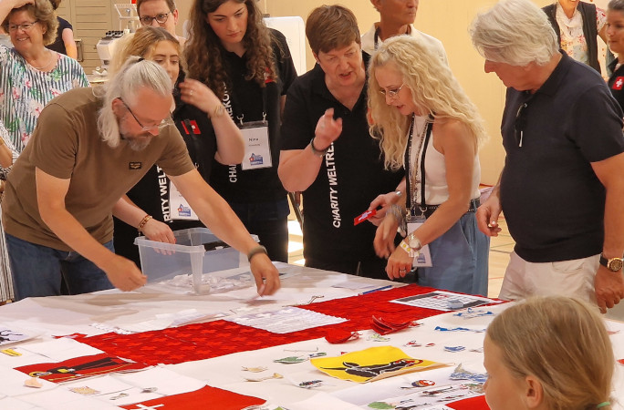 A group of volunteers assembling the squares