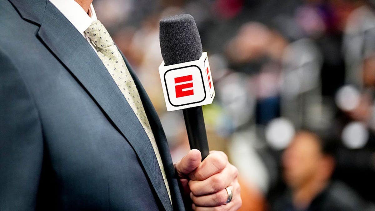 ESPN logo on a microphone before a game at Little Caesars Arena.