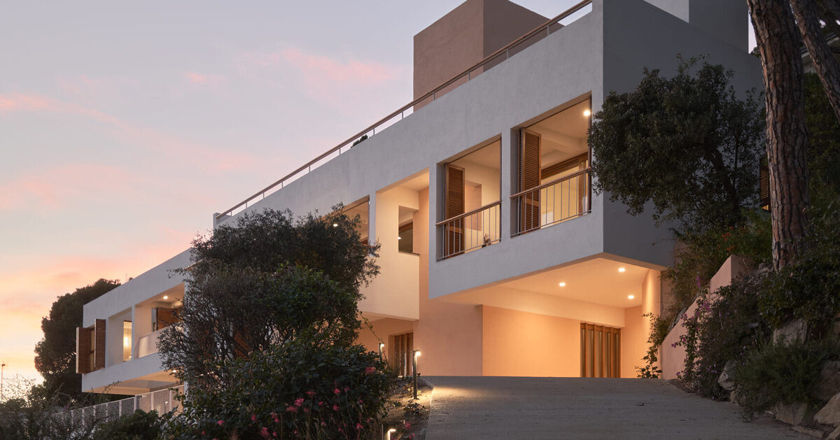 open patios and white geometric terraces extend casa blajot along catalan coast