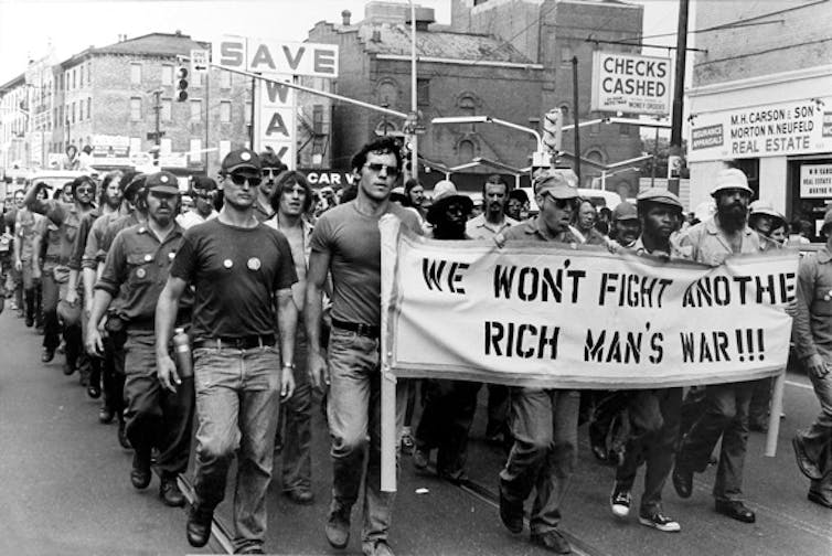 Supporters affiliated with VVAW march in protest during the Bicentennial, Philadelphia 1976