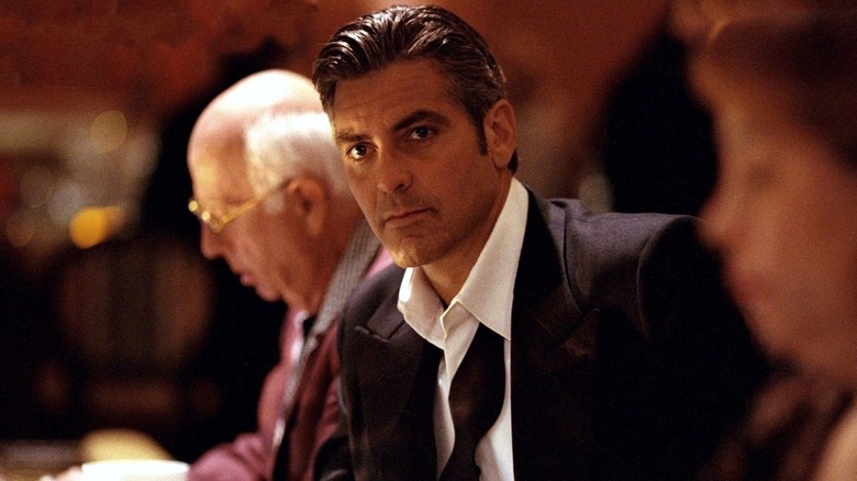 George Clooney looking elegantly disheveled in a tux as Danny Ocean in Ocean's Eleven (2001)