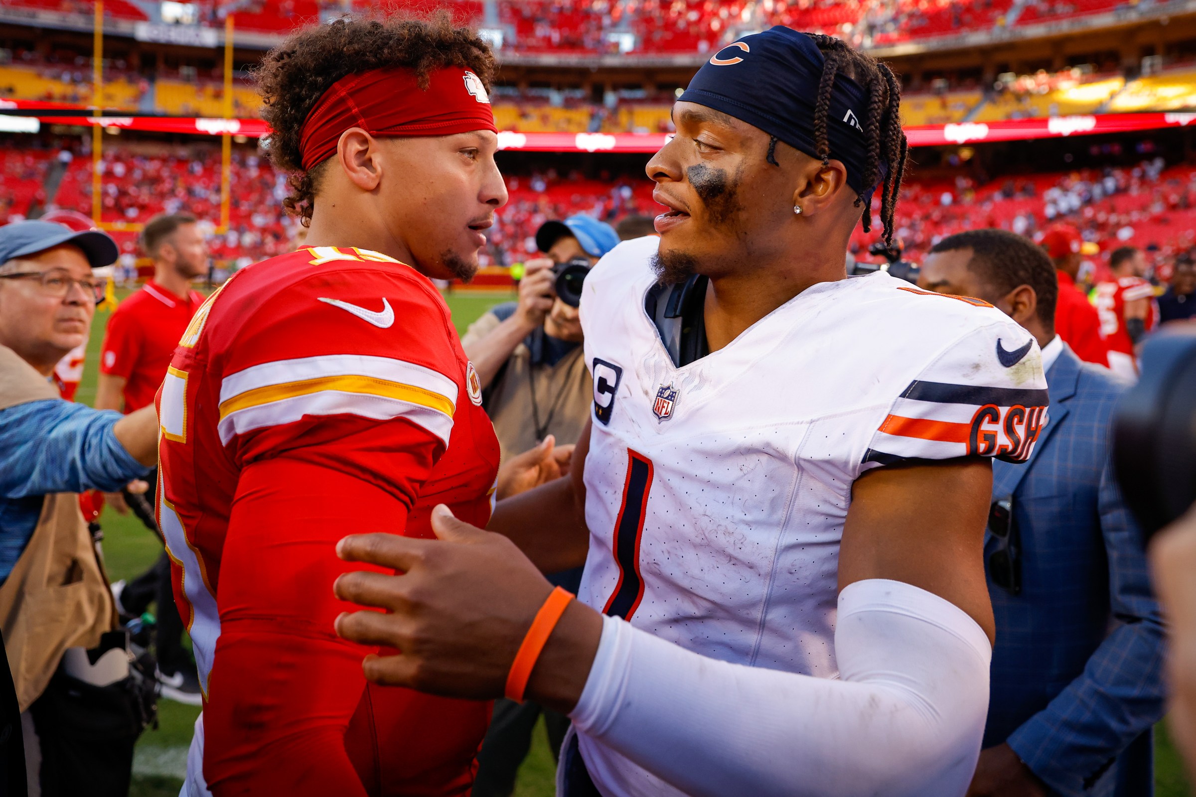 KANSAS CITY, MISSOURI - SEPTEMBER 24: Patrick Mahomes #15 of the Kansas City Chiefs greets Justin Fields #1 of the Chicago Bears after the game at GEHA Field at Arrowhead Stadium on September 24, 2023 in Kansas City, Missouri. (Photo by David Eulitt/Getty Images)
