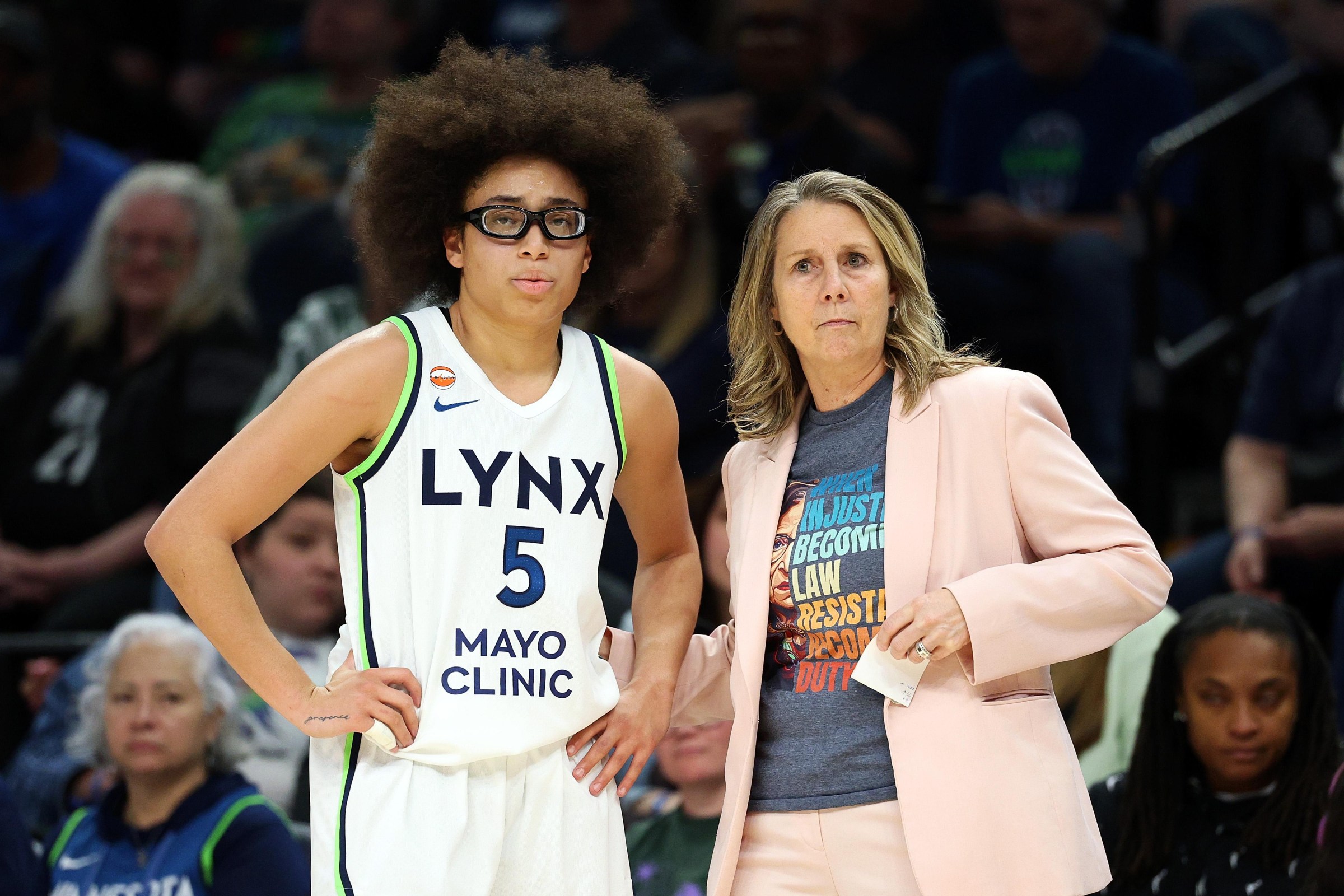 MINNEAPOLIS, MINNESOTA - MAY 17: Olivia Miles #5 and Cheryl Reeve of the Minnesota Lynx look on against the Chicago Sky in the second quarter at Target Center on May 17, 2026 in Minneapolis, Minnesota. The Sky defeated the Lynx 86-79. NOTE TO USER: User expressly acknowledges and agrees that, by downloading and or using this photograph, User is consenting to the terms and conditions of the Getty Images License Agreement. (Photo by David Berding/Getty Images)