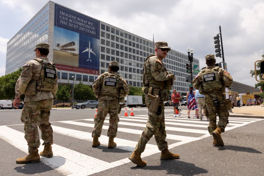 Members of the National Guard block off a street outside of the Great American State Fair at the National Mall in Washington, DC, June 29, 2026.