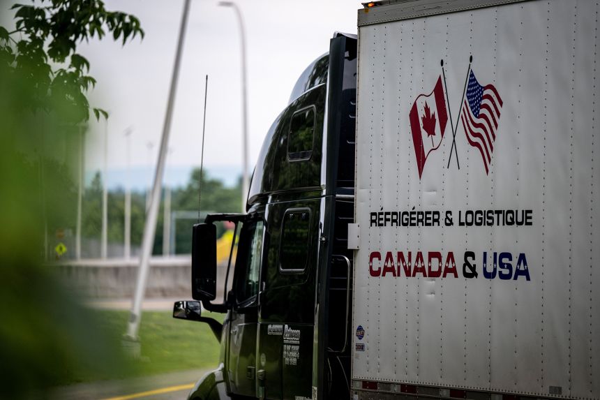 A truck drives into the United States at the Canada-US border in Saint-Bernard-de-Lacolle, Quebec, Canada, on Tuesday, June 30, 2026.