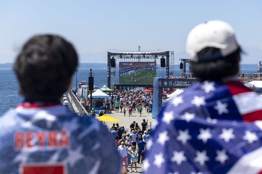 USA fans watch the FIFA World Cup Round of 16 match between Portugal and Spain at the Seattle Soccer Celebration on Pier 58 in Seattle, Washington, on July 6.