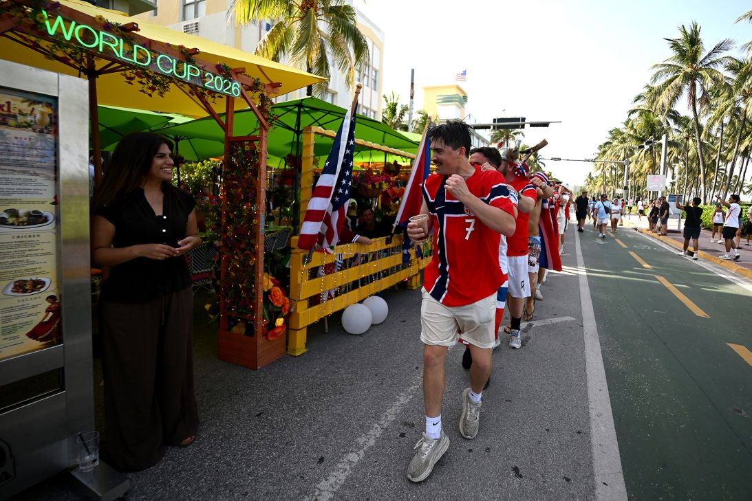Norwegian soccer fans form a conga line as they rally for their team on July 10 in Miami Beach, Florida, ahead of Norway's World Cup quarterfinal matchup against England the next day.