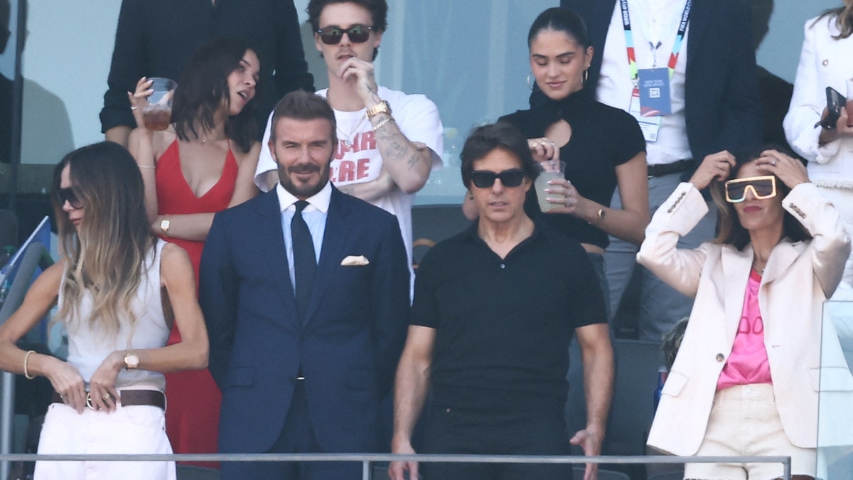 Victoria Beckahm, David Beckham, Tom Cruise, Jackie Apostel, Cruz Beckham and Kim Turnball attend the 2026 World Cup football tournament