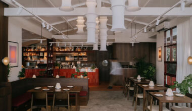 lantern-like pavilion reshapes bangkok house into arvie restaurant