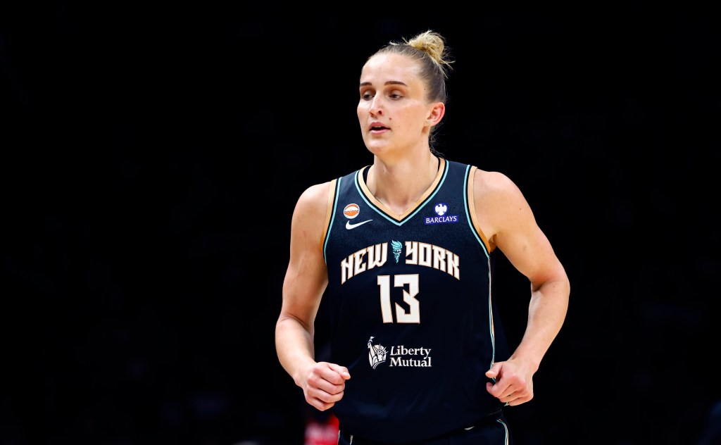 WNBA player Leonie Fiebich in a New York Liberty jersey.