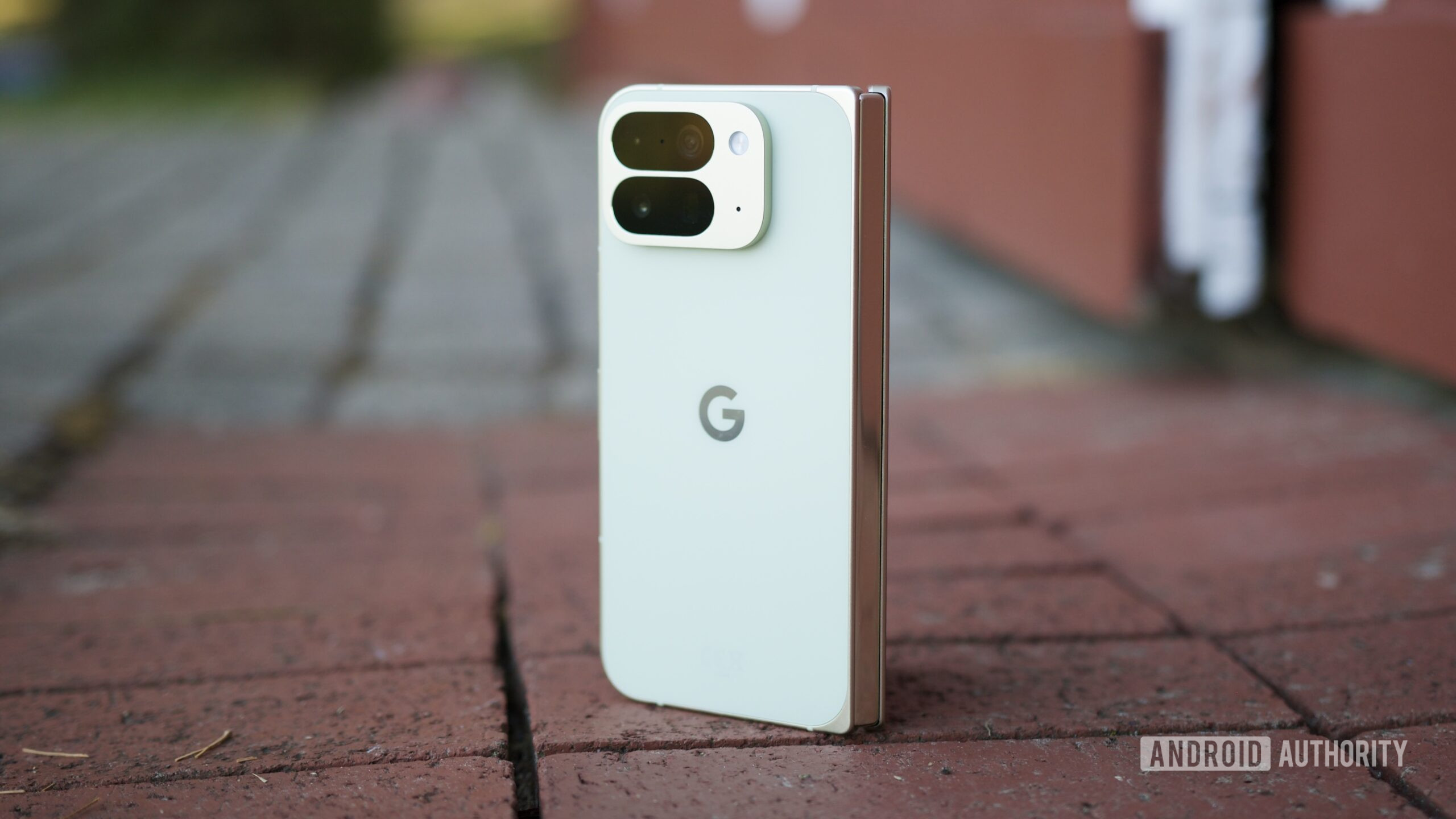 The Google Pixel 10 Pro Fold standing upright outside.