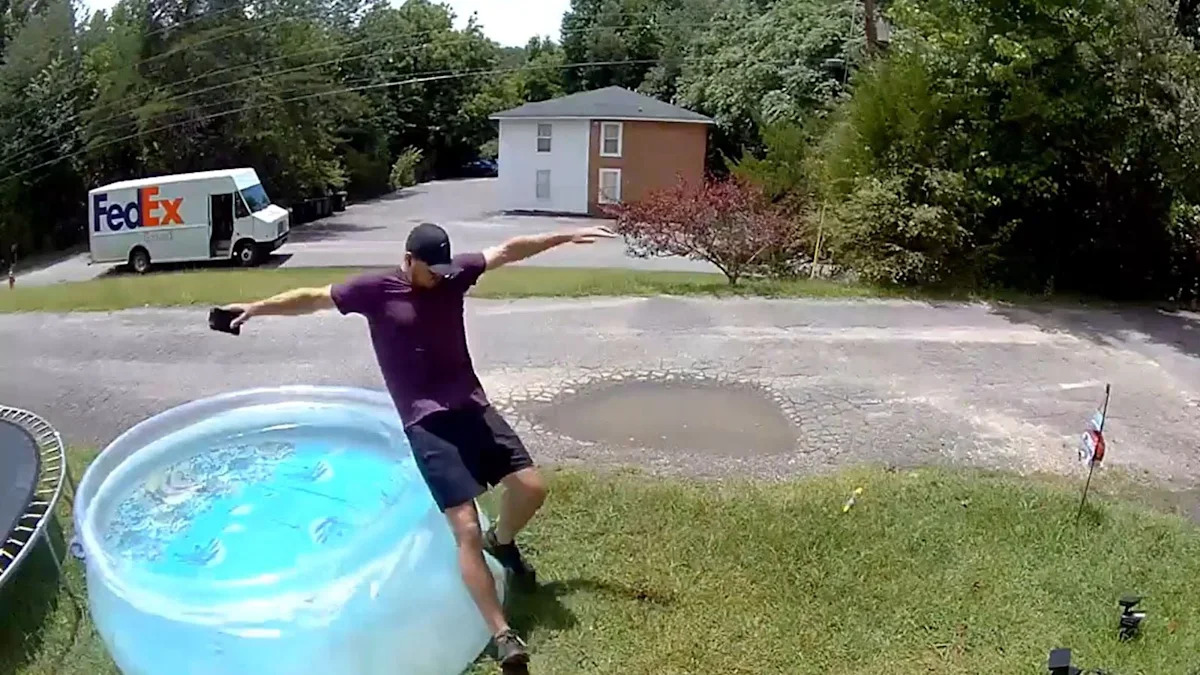 FedEx Delivery Driver Falling Into a Front Yard Pool Outside a Georgia Home Shows What Seconds of Screen Distraction Can Do