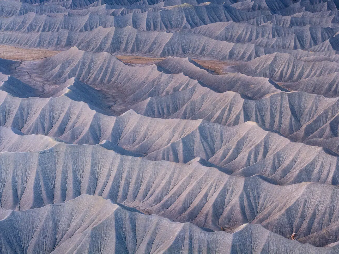 A.J. Rich, United States. Serration. The sharp, steep and layered hills in the Badlands of Utah. 