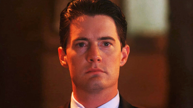 Kyle MacLachlan's Dale Cooper is seen in closeup in Twin Peaks