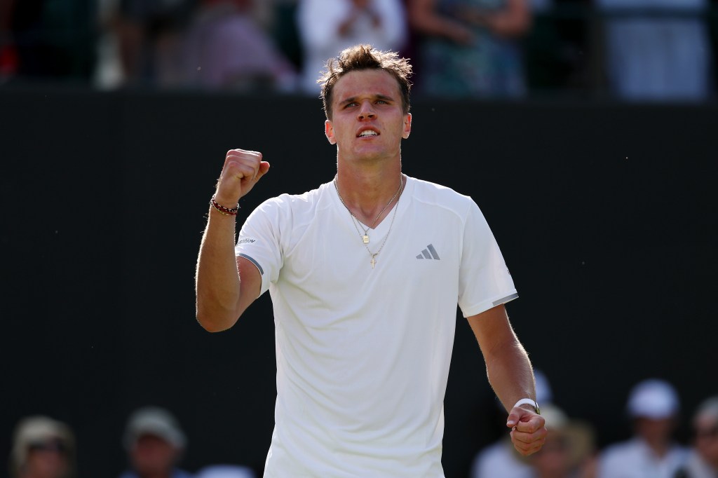 Jakub Mensik of Czechia celebrates his victory during a Gentlemen's Singles match at Wimbledon.