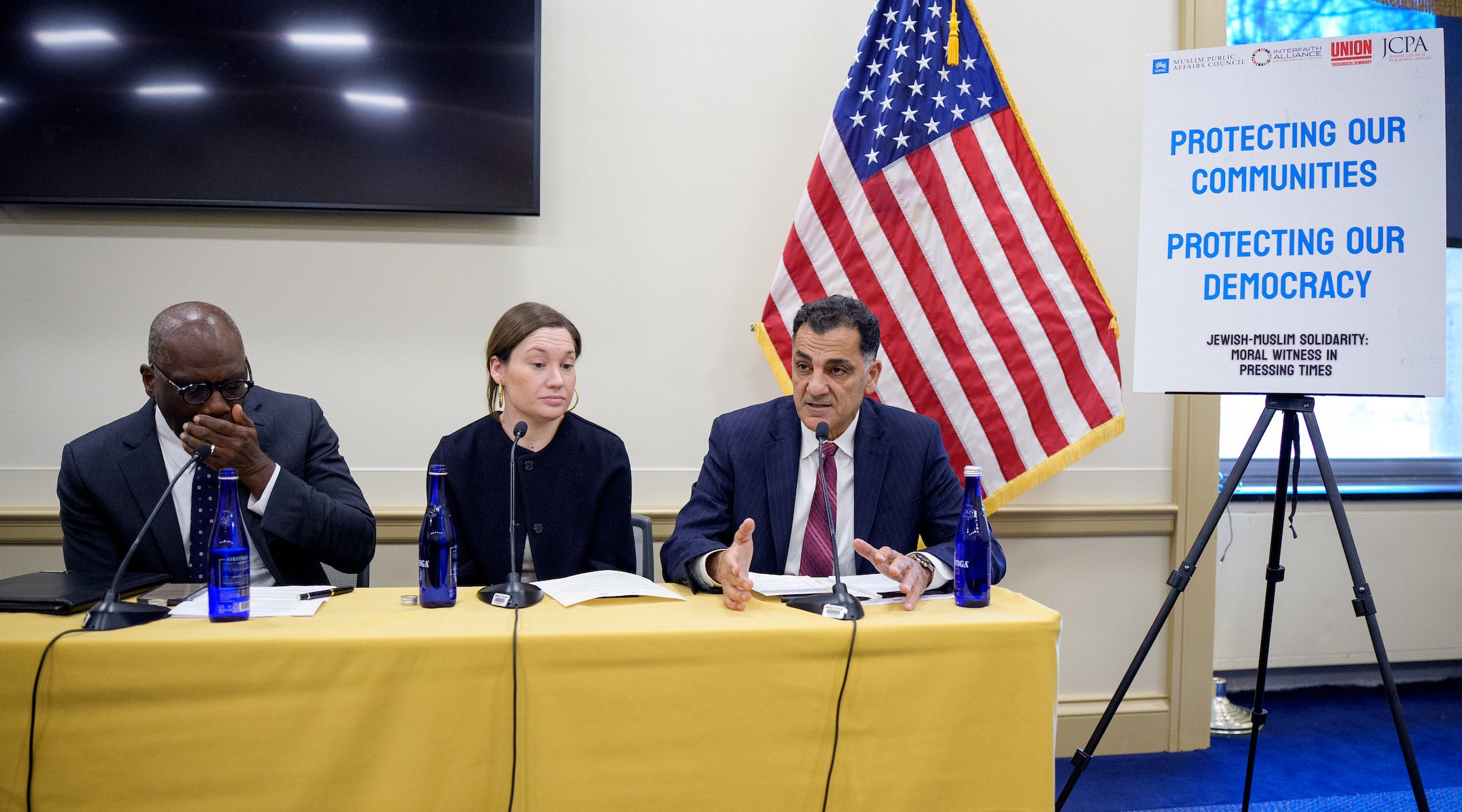 A photo of spitalnick speaking on a panel.