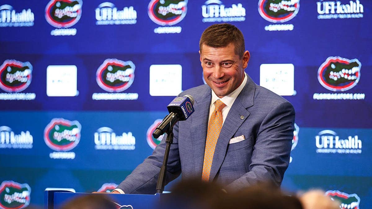 Jon Sumrall speaks at a press conference introducing him as the new Florida Gators head coach.