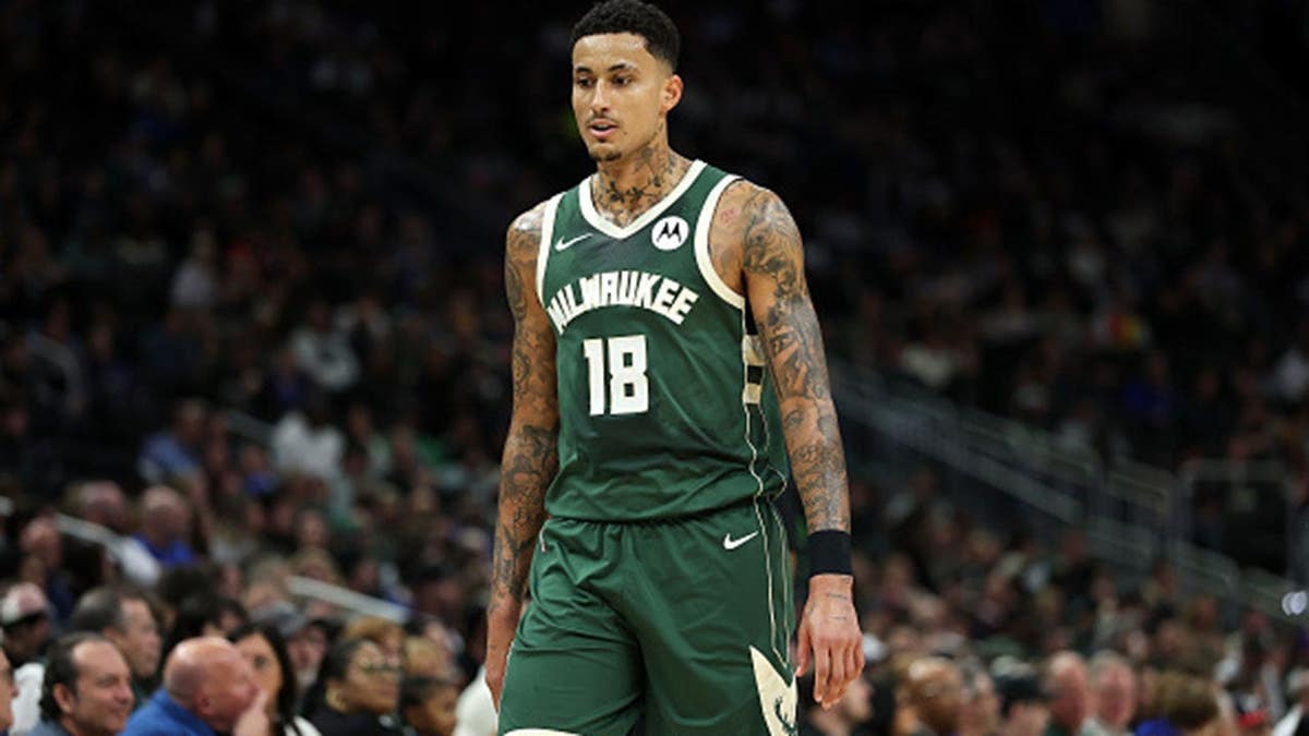 Kyle Kuzma of the Milwaukee Bucks walks backcourt during a game against the Dallas Mavericks.