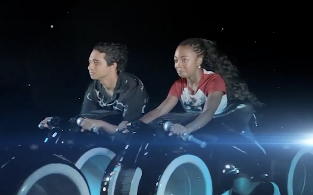 'Percy Jackson' Stars Leah Sava Jeffries and Aryan Simhadri Try Not to React on TRON Lightcycle Run