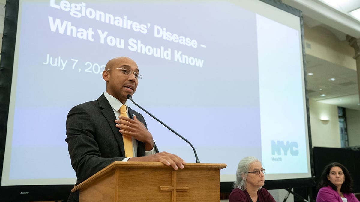 Dr. Alister Martin speaks at a town hall meeting in New York.