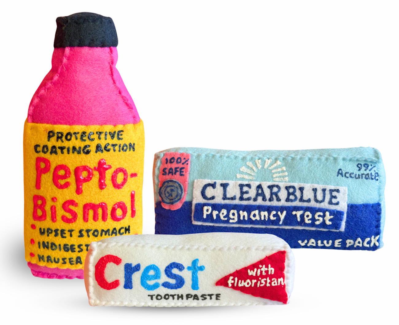 Pepto-Bismol, Clear Blue Pregnancy Test, and Crest Toothepaste reimagined in felt by artist Lucy Sparrow