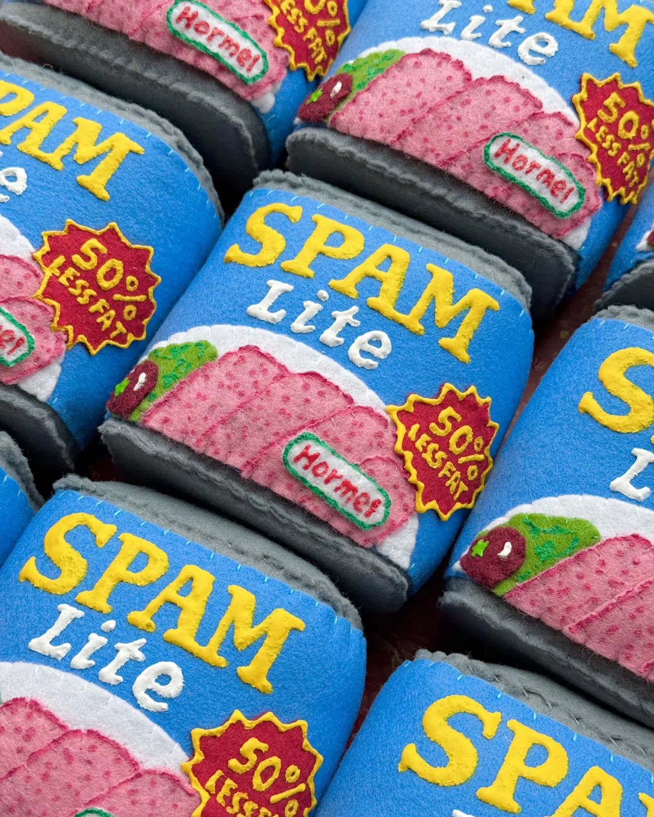 Cans of Spam Lite reimagined in felt by artist Lucy Sparrow