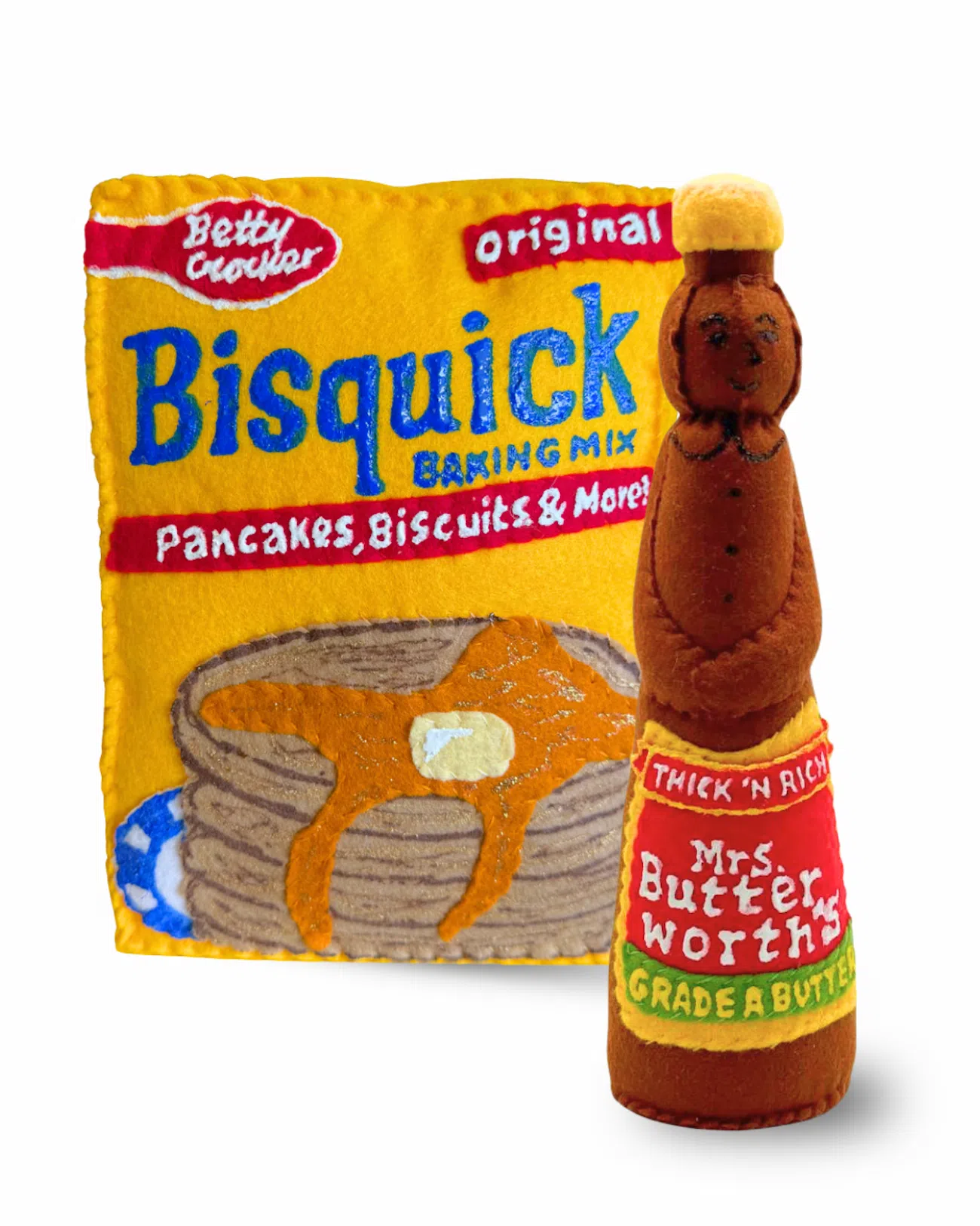 Bisquick package and bottle of Mrs. Butterworth's syrup reimagined in felt by artist Lucy Sparrow