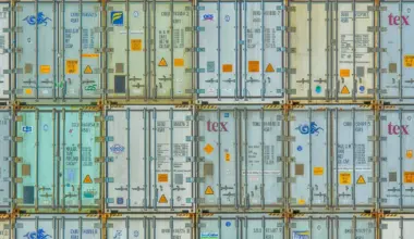 A vibrant display of stacked shipping containers, highlighting industrial organization.