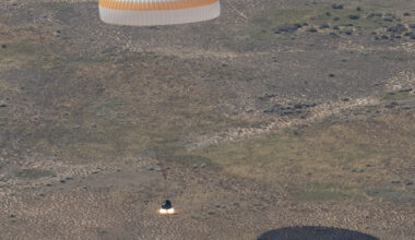 The Soyuz MS-28 spacecraft is seen as it lands in a remote area near the town of Zhezkazgan, Kazakhstan