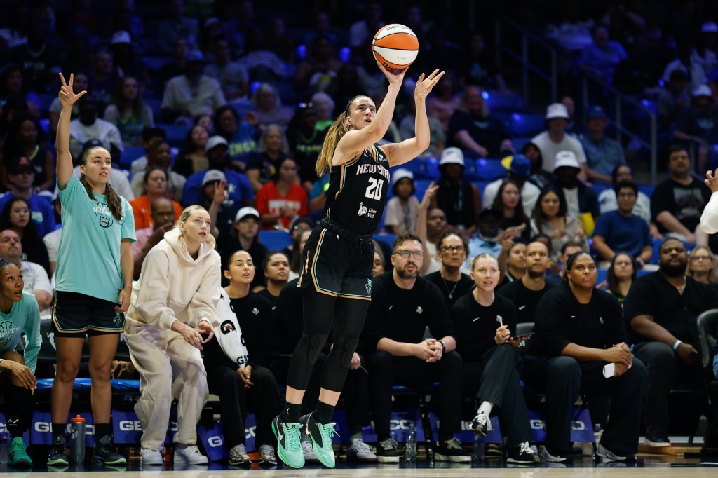 New York Liberty guard Sabrina Ionescu (20) shoots a three-point basket against the Dallas Wings.