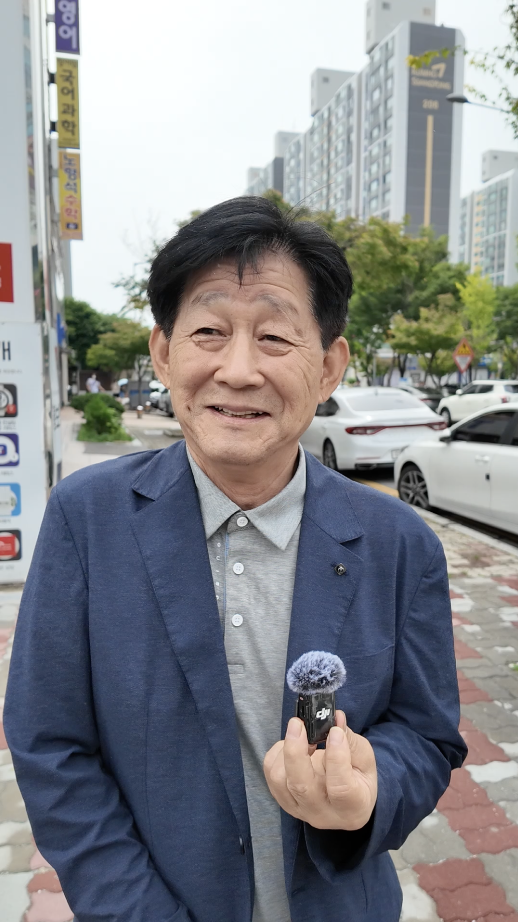 Writer and painter Hong Seong-gook sees the semiconductor investment as an economic opportunity and long-overdue recognition for the Honam region. (Tammy Park/The Korea Herald)