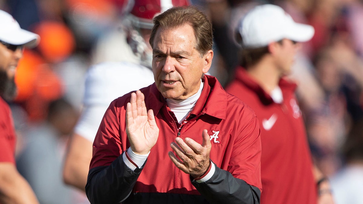 Nick Saban coaches a game