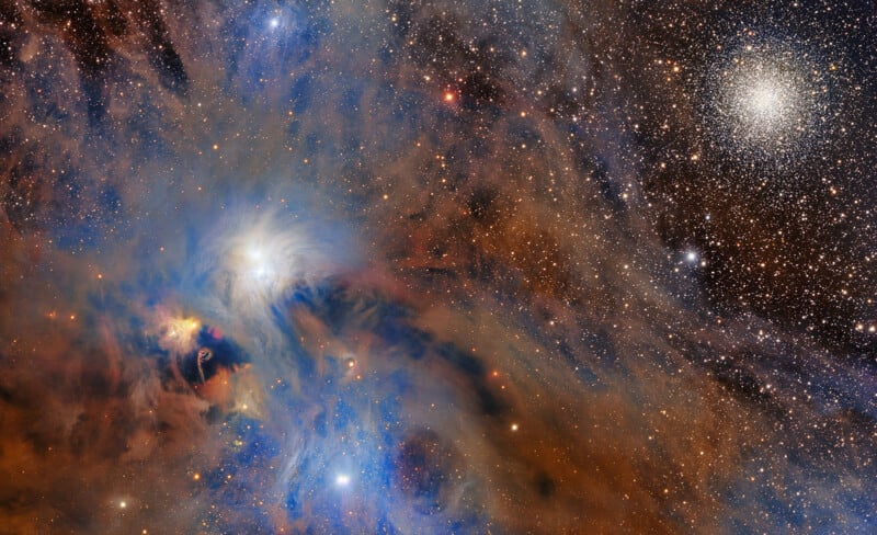 Colorful nebula with blue and orange gas clouds, bright stars, and a dense, spherical star cluster on the right side against a dark space background.