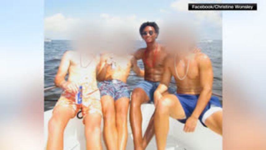Nolan Wells is pictured with his friends on a boat during the Fourth of July.