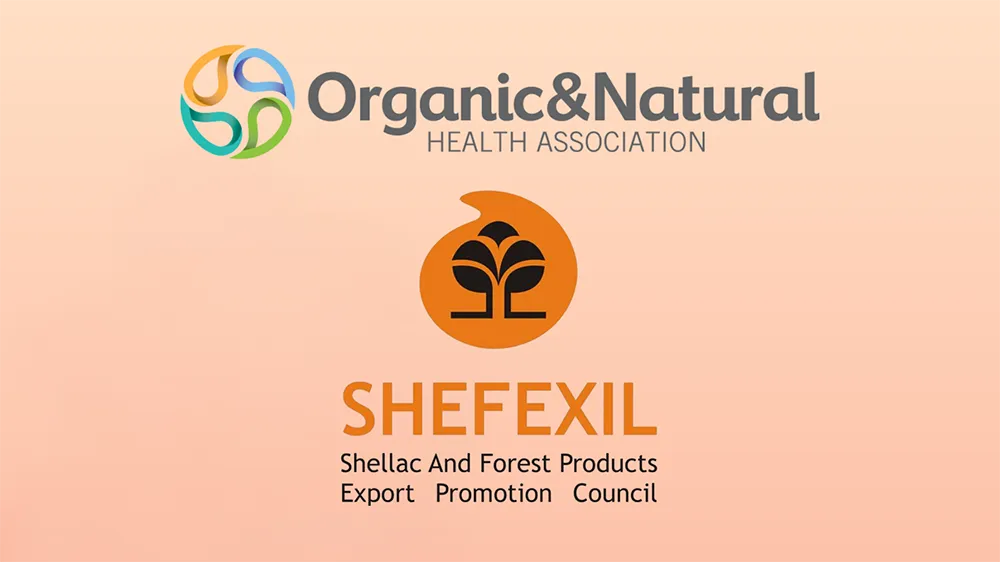 Logos of Organic & Natural Health Association and SHEFEXIL on a peach background Logos of Organic & Natural Health Association and SHEFEXIL on a peach background