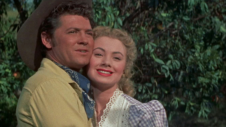 Curly holding Laurey in Oklahoma!