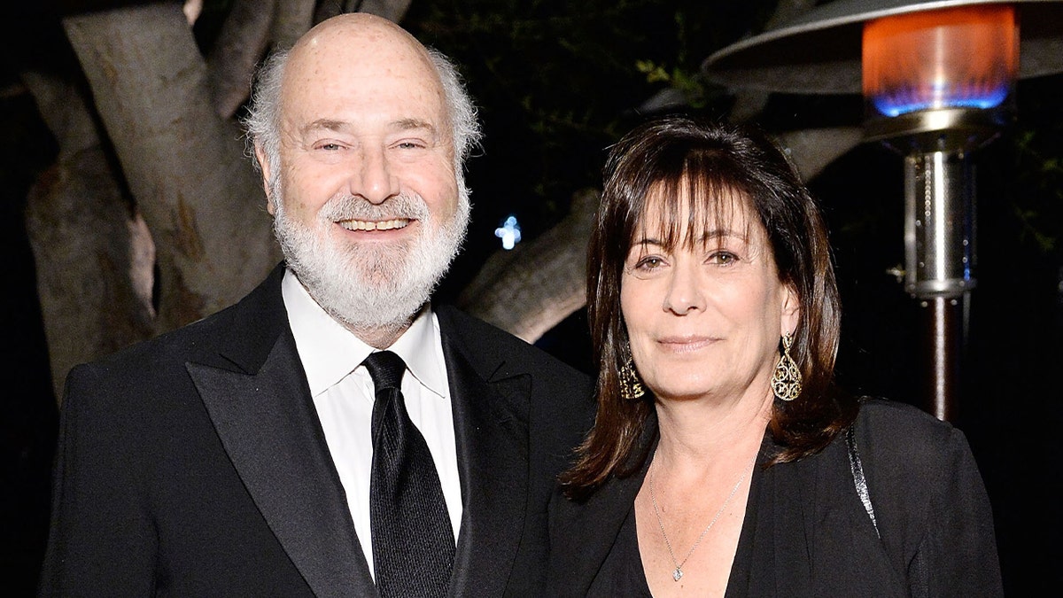 Rob Reiner and Michele Reiner smiling together.