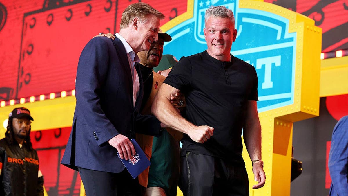 Roger Goodell talks with Pat McAfee on stage at the 2026 NFL Draft.