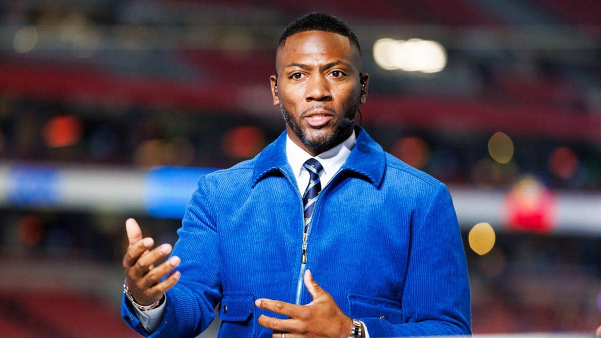 Ryan Clark stands at State Farm Stadium before the NFC Wild Card Playoff game between the Minnesota Vikings and Los Angeles Rams.