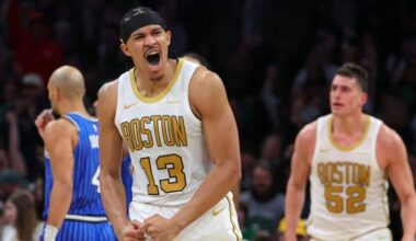 Boston Celtics Ron Harper Jr. #13 reacts after teammate Baylor Scheierman #55 made a three point basket against the Orlando Magic during third quarter NBA action at TD Garden on Saturday April 12, 2026.