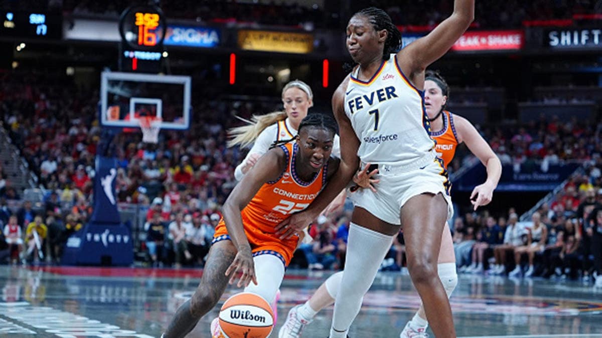 Saniya Rivers drives to the basket against Aliyah Boston.