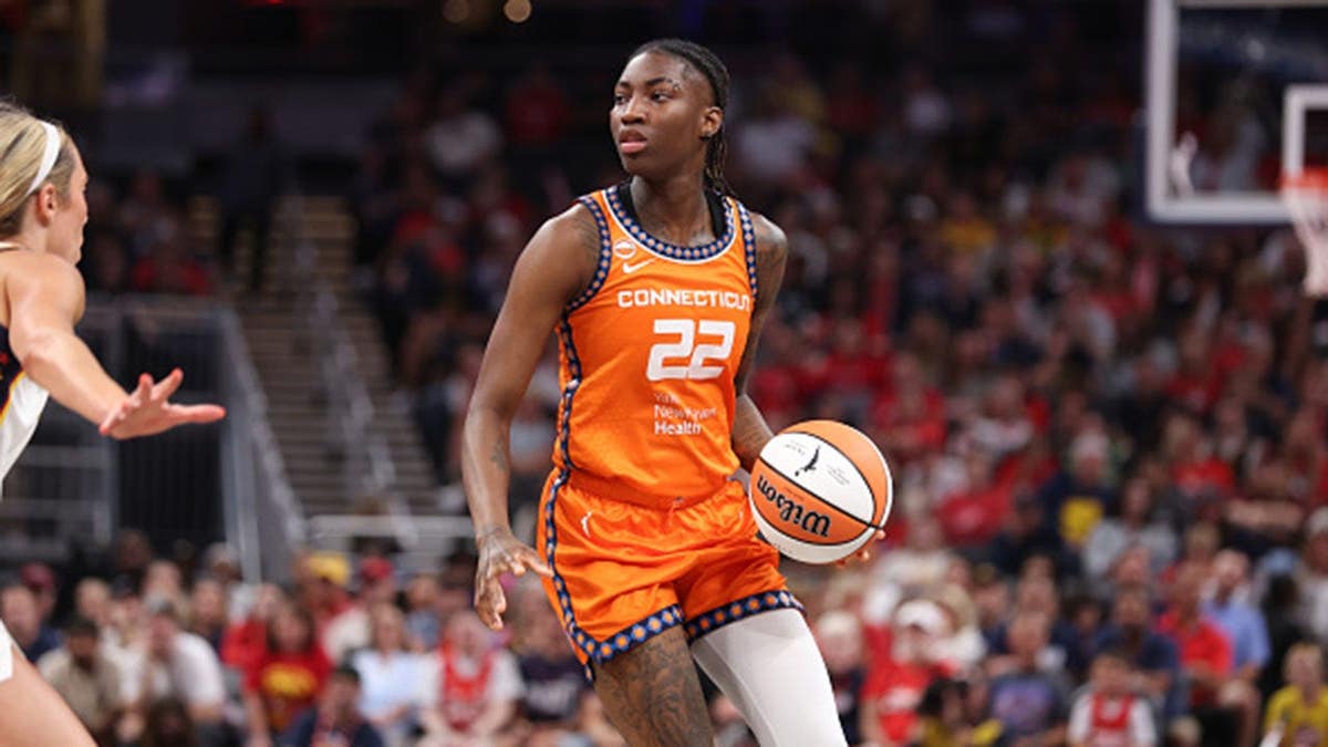 Saniya Rivers dribbles the ball during a Connecticut Sun game against the Indiana Fever at Gainbridge Fieldhouse.