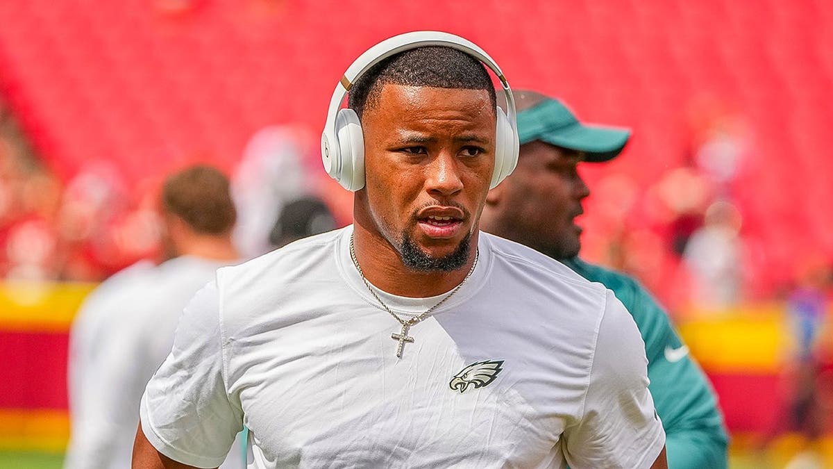 Philadelphia Eagles running back Saquon Barkley warms up for a game against the Kansas City Chiefs prior to a game at GEHA Field at Arrowhead Stadium on Sept. 14, 2025. 