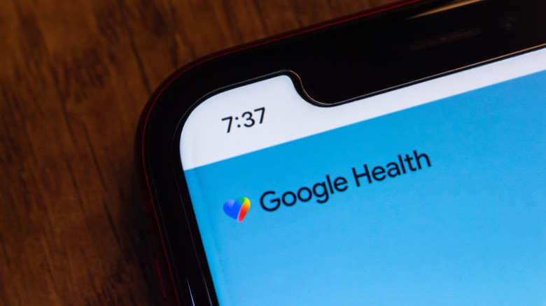 The side view of a phone showing the Google Health app.