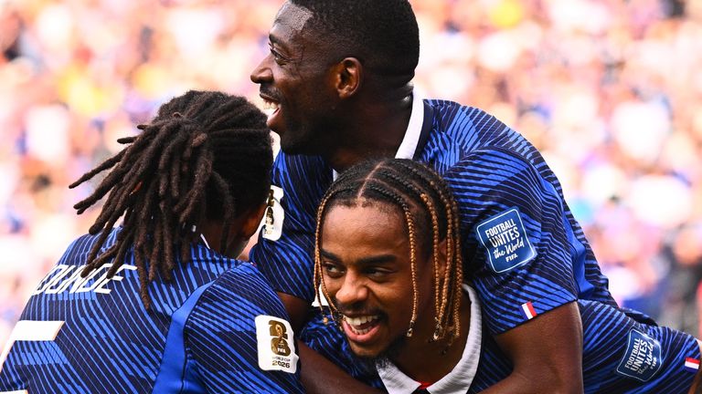 30 June 2026, USA, East Rutherford: Soccer, Men, 2026 World Cup, France vs. Sweden, Knockout Stage, Round of 32, New York -New Jersey Stadium, Bradley Barcola (right, France) celebrates his goal to make it 2-0 with Ousmane Demb..l.. (France, center) and Jules Kound.. (France). PLEASE NOTE: In accordance with FIFA regulations, these images may be used exclusively for editorial purposes. Commercial use is prohibited. Furthermore, no video-like sequences may be created, and no alterations may be made to the image, either in the foreground or the background. Photo by: Tom Weller/picture-alliance/dpa/AP Images