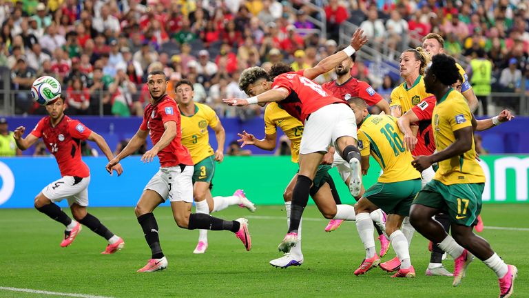 Emam Ashour heads Egypt in front against Australia at the World Cup