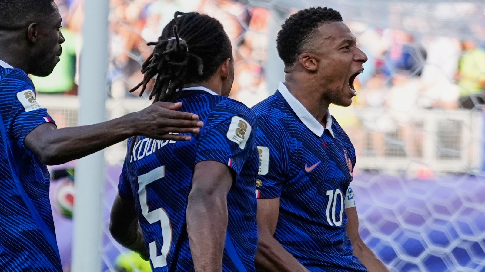 France's Kylian Mbappe celebrates after scoring his penalty